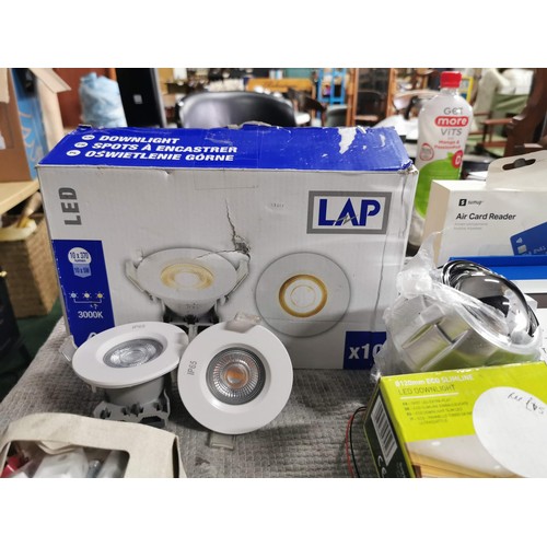 74 - Box of electrical items inc a large quantity of spot lights, boxed as new paymnet air card reader et... 