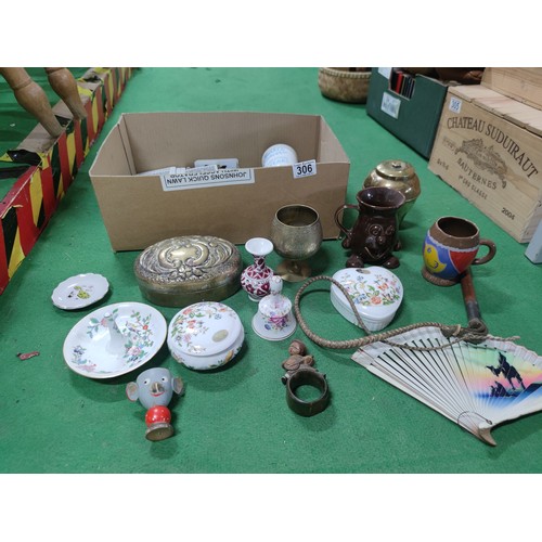 306 - A box containing a quantity of collectables including a brass Liptons souvenir tea caddy celebrating... 