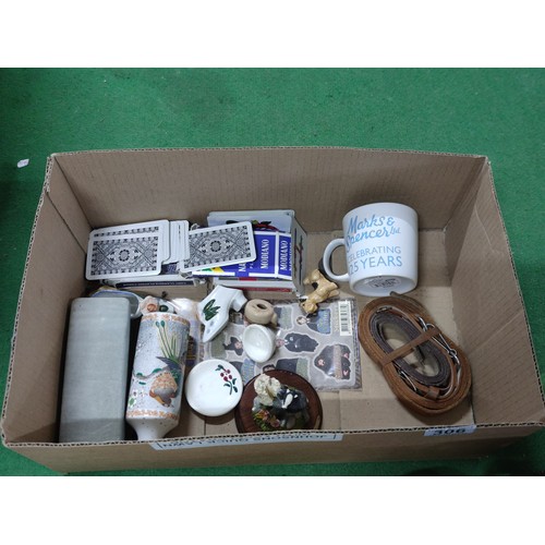 306 - A box containing a quantity of collectables including a brass Liptons souvenir tea caddy celebrating... 
