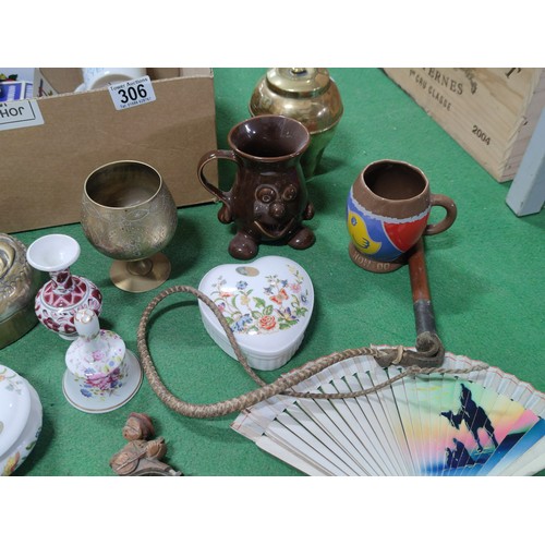 306 - A box containing a quantity of collectables including a brass Liptons souvenir tea caddy celebrating... 