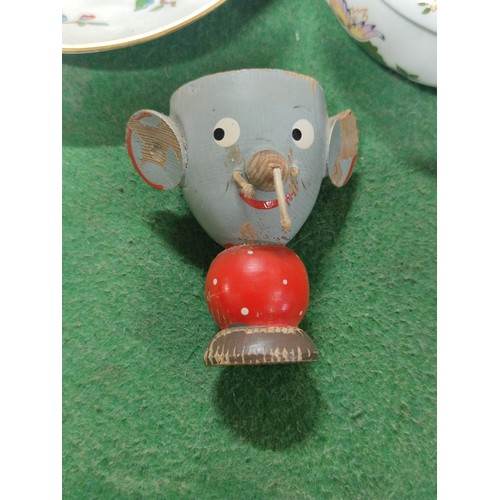 306 - A box containing a quantity of collectables including a brass Liptons souvenir tea caddy celebrating... 