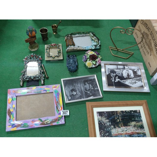 307 - A box containing a quantity of collectables including a photo of John Lennon in a recording studio, ... 