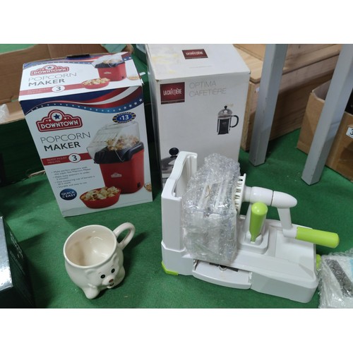 308 - A box containing a 5 bladed spiralizer a cafetiere, popcorn maker,2 moka pots etc.