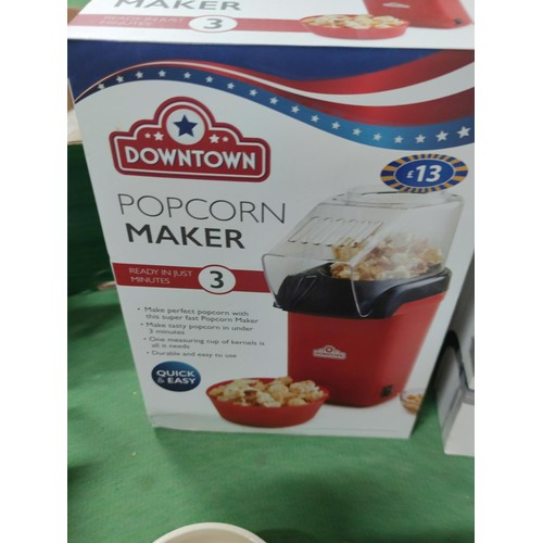 308 - A box containing a 5 bladed spiralizer a cafetiere, popcorn maker,2 moka pots etc.