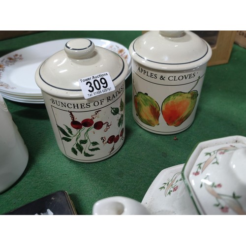 309 - A box containing a quantity of collectables including 2 wooden egg storage boxes, 5 arcopal platters... 