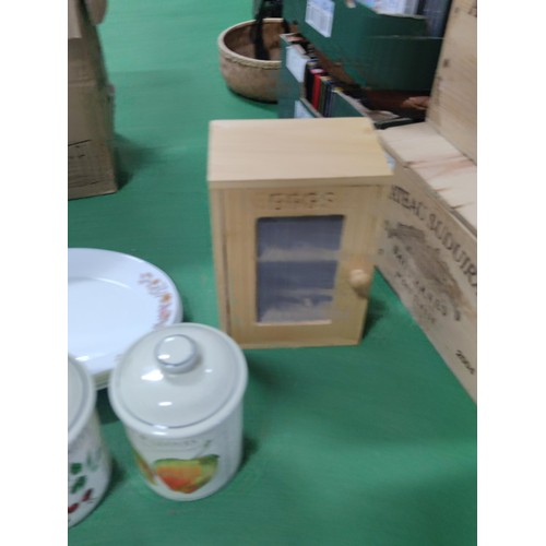 309 - A box containing a quantity of collectables including 2 wooden egg storage boxes, 5 arcopal platters... 
