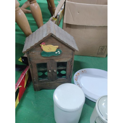 309 - A box containing a quantity of collectables including 2 wooden egg storage boxes, 5 arcopal platters... 