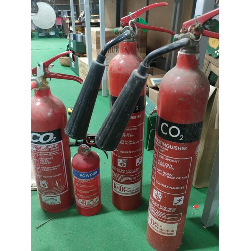 310 - A collection of 4 vintage fire extinguishers, 3 for CO2
and a small powder one, all empty.
Tallest o... 