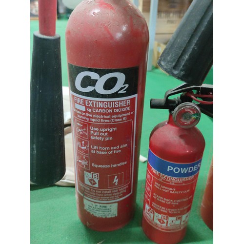 310 - A collection of 4 vintage fire extinguishers, 3 for CO2
and a small powder one, all empty.
Tallest o... 