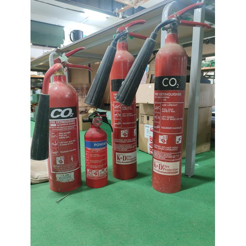 310 - A collection of 4 vintage fire extinguishers, 3 for CO2
and a small powder one, all empty.
Tallest o... 