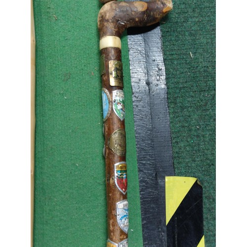 315 - A collection of 4 walking sticks including a collapsible mobility aid stick, one contains a large qu... 
