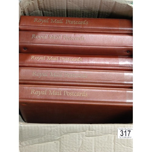 317 - A box containing a quantity of Royal Mail and other postcard/PHQ albums. Empty!