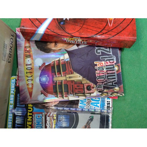 321 - A box containing a large quantity of Dr Who memorabilia. Including storybooks, annuals, sealed magaz... 