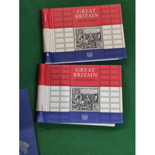 322 - A cardboard box containing a god quantity of empty vintage and modern stamp albums etc, including St... 