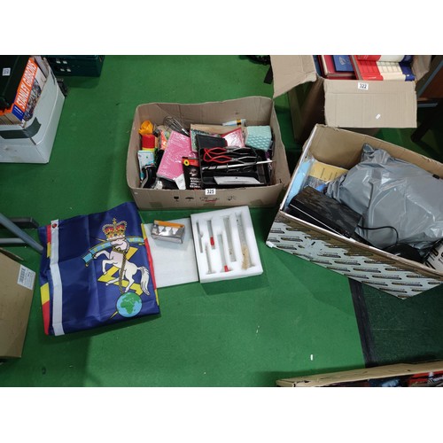 325 - 2 boxes containing a large quantity of household items including a cd player, beer testing equipment... 