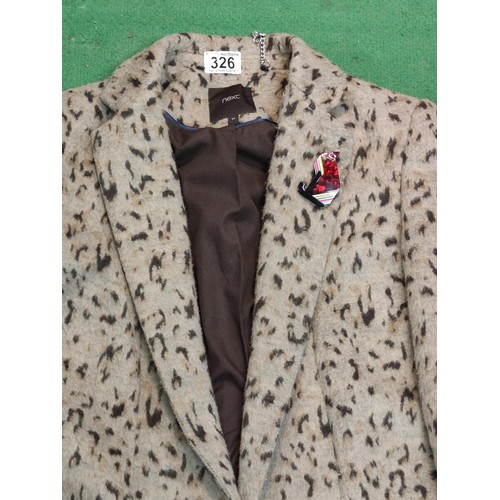 326 - A ladies next (size 14) Cheetah pattern coat with a lea stein style brooch to the lapel,
a tweed ter... 