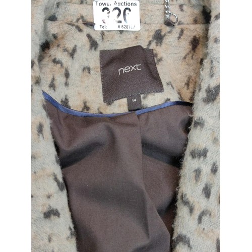 326 - A ladies next (size 14) Cheetah pattern coat with a lea stein style brooch to the lapel,
a tweed ter... 