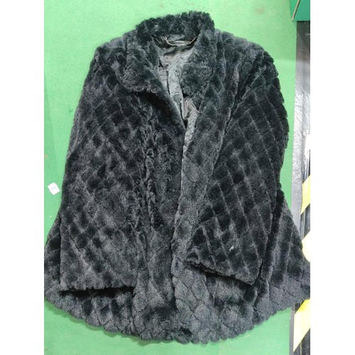 326 - A ladies next (size 14) Cheetah pattern coat with a lea stein style brooch to the lapel,
a tweed ter... 