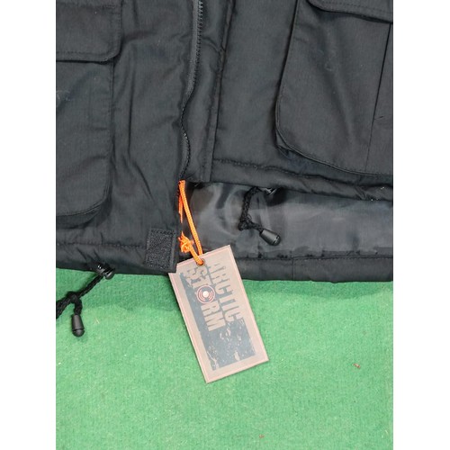 327 - A gents premier man 2XL all weather jacket in good order along with an arctic storm XXL gilet with c... 