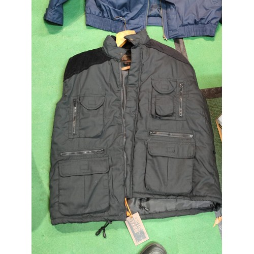 327 - A gents premier man 2XL all weather jacket in good order along with an arctic storm XXL gilet with c... 