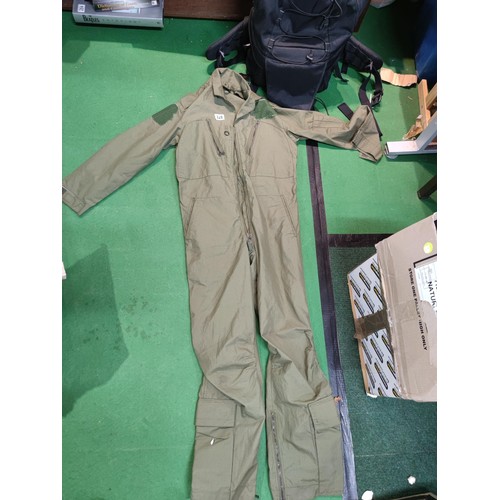 328 - An air crew mk 14A jumpsuit with broad arrow mark size 5. In good order, name and rank badges have b... 