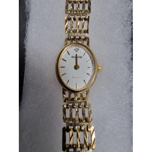 408 - A 9ct hallmarked yellow gold ladies watch by Accurist. Case and strap is yellow gold In good conditi... 