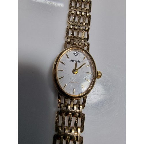 408 - A 9ct hallmarked yellow gold ladies watch by Accurist. Case and strap is yellow gold In good conditi... 