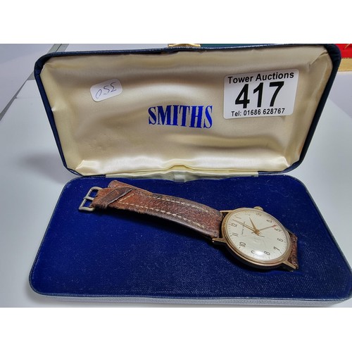417 - A good quality hallmarked 9ct yellow gold gents watch by Smiths Astral. In good vintage condition wi... 