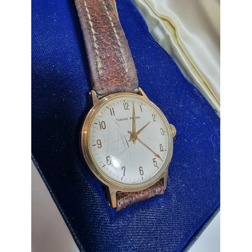 417 - A good quality hallmarked 9ct yellow gold gents watch by Smiths Astral. In good vintage condition wi... 