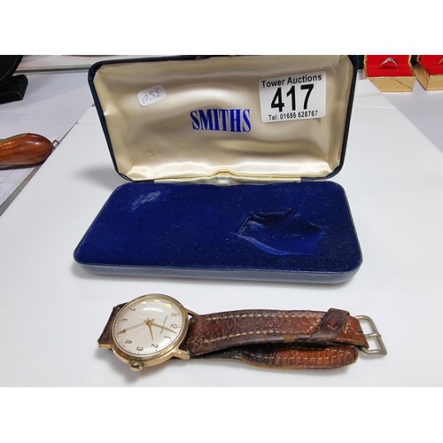 417 - A good quality hallmarked 9ct yellow gold gents watch by Smiths Astral. In good vintage condition wi... 
