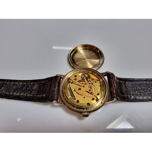 417 - A good quality hallmarked 9ct yellow gold gents watch by Smiths Astral. In good vintage condition wi... 