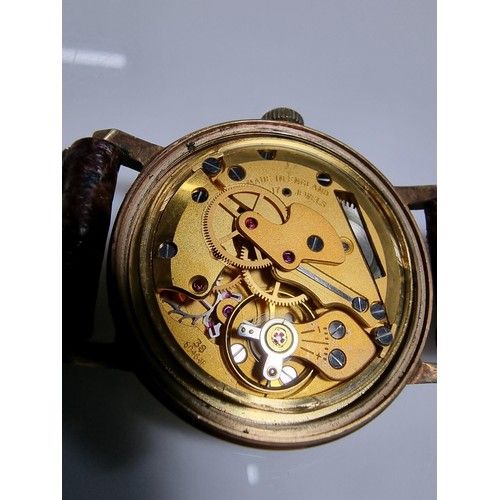 417 - A good quality hallmarked 9ct yellow gold gents watch by Smiths Astral. In good vintage condition wi... 