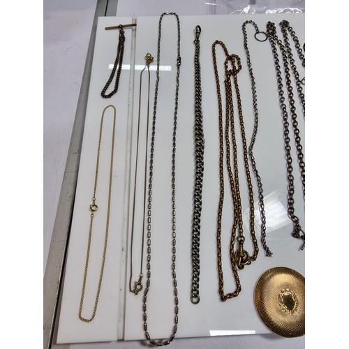 345 - A suite of various pocket watch / Albert chains along with a quantity of various pocket watch fobs, ... 