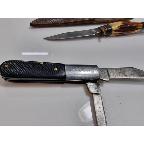 346 - 2 collectable knives including a vintage small antler handled knife with an aluminium pommel, made i... 