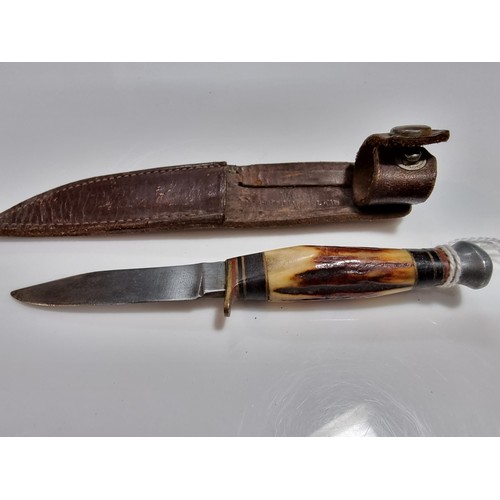 346 - 2 collectable knives including a vintage small antler handled knife with an aluminium pommel, made i... 