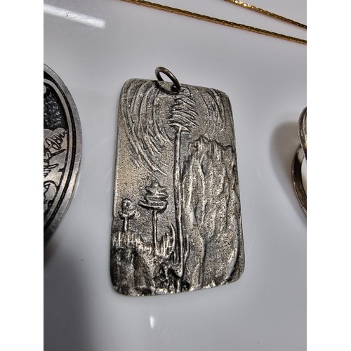 347 - A quantity of collectable jewellery including an unusually pewter pendant most likely Danish, along ... 
