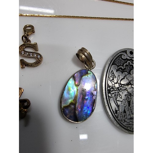 347 - A quantity of collectable jewellery including an unusually pewter pendant most likely Danish, along ... 