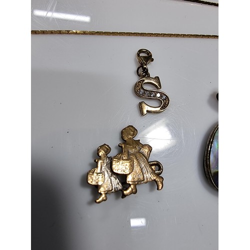 347 - A quantity of collectable jewellery including an unusually pewter pendant most likely Danish, along ... 