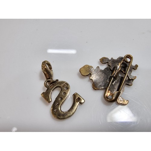 347 - A quantity of collectable jewellery including an unusually pewter pendant most likely Danish, along ... 