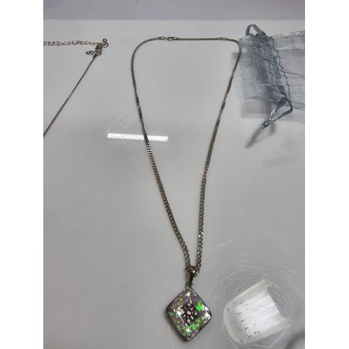 349 - A quantity of jewellery including a 925 silver pendant and chain inset with opal and small diamonds ... 