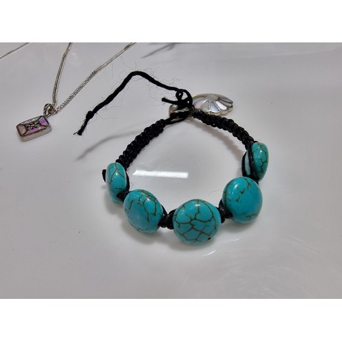 349 - A quantity of jewellery including a 925 silver pendant and chain inset with opal and small diamonds ... 