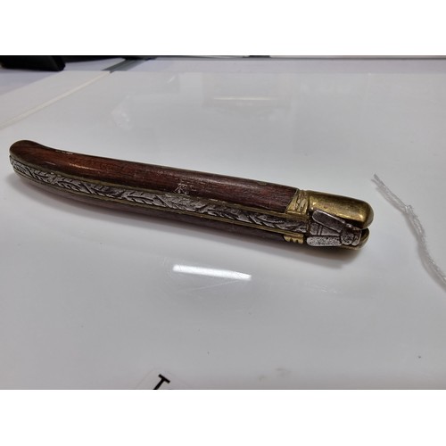 350 - A good quality vintage laguiole folding knife with a wooden handle. Made in France, with a trademark... 