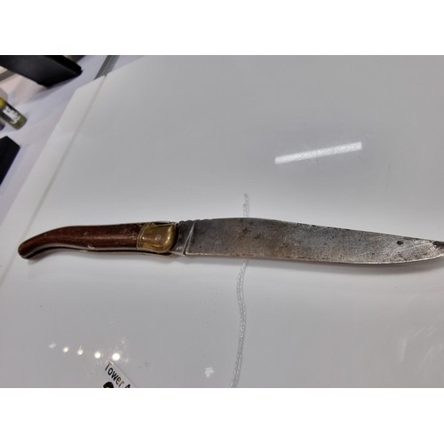 350 - A good quality vintage laguiole folding knife with a wooden handle. Made in France, with a trademark... 