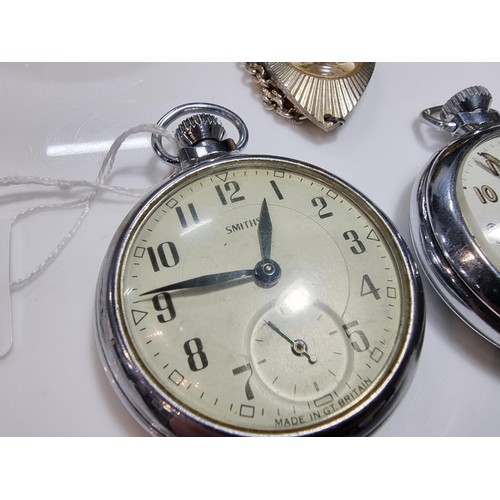 352 - 2 x pocket watches. A smiths and a Ingersoll along with a smith pendant watch and 3 pocket watch cas... 