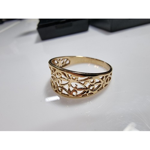 353 - 3 x boxed attractive dress rings including a ring with pink gems all the way around a pierced ring a... 