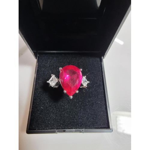 354 - 2 x pretty dress rings, both 18 ct gold plated.
Both rings are inset with a large pink sapphire ston... 