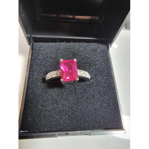 354 - 2 x pretty dress rings, both 18 ct gold plated.
Both rings are inset with a large pink sapphire ston... 