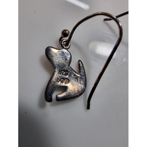 360 - A pair of 925 silver dog formed drop earrings in clean boxed condition (marked 925).