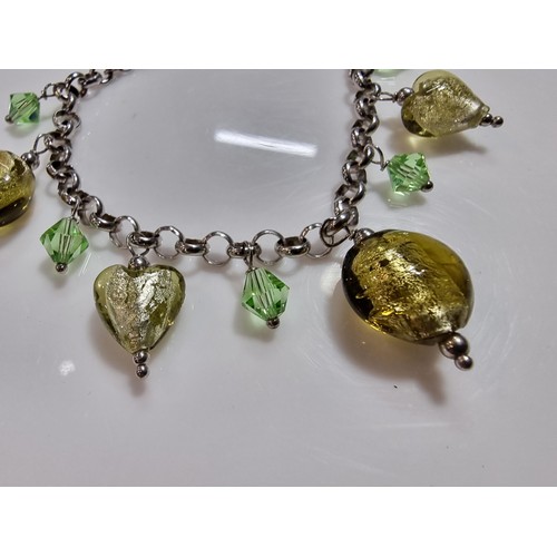 363 - A 925 silver charm bracelet with various art glass charms, boxed in excellent condition (marked 925)... 