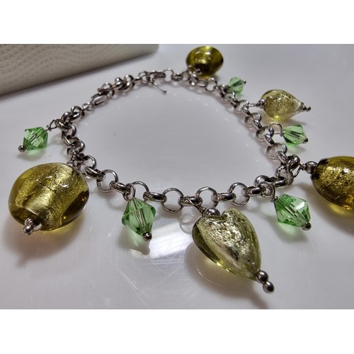 363 - A 925 silver charm bracelet with various art glass charms, boxed in excellent condition (marked 925)... 